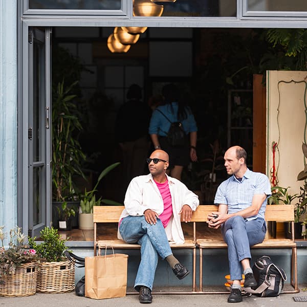 Sitting outside shop