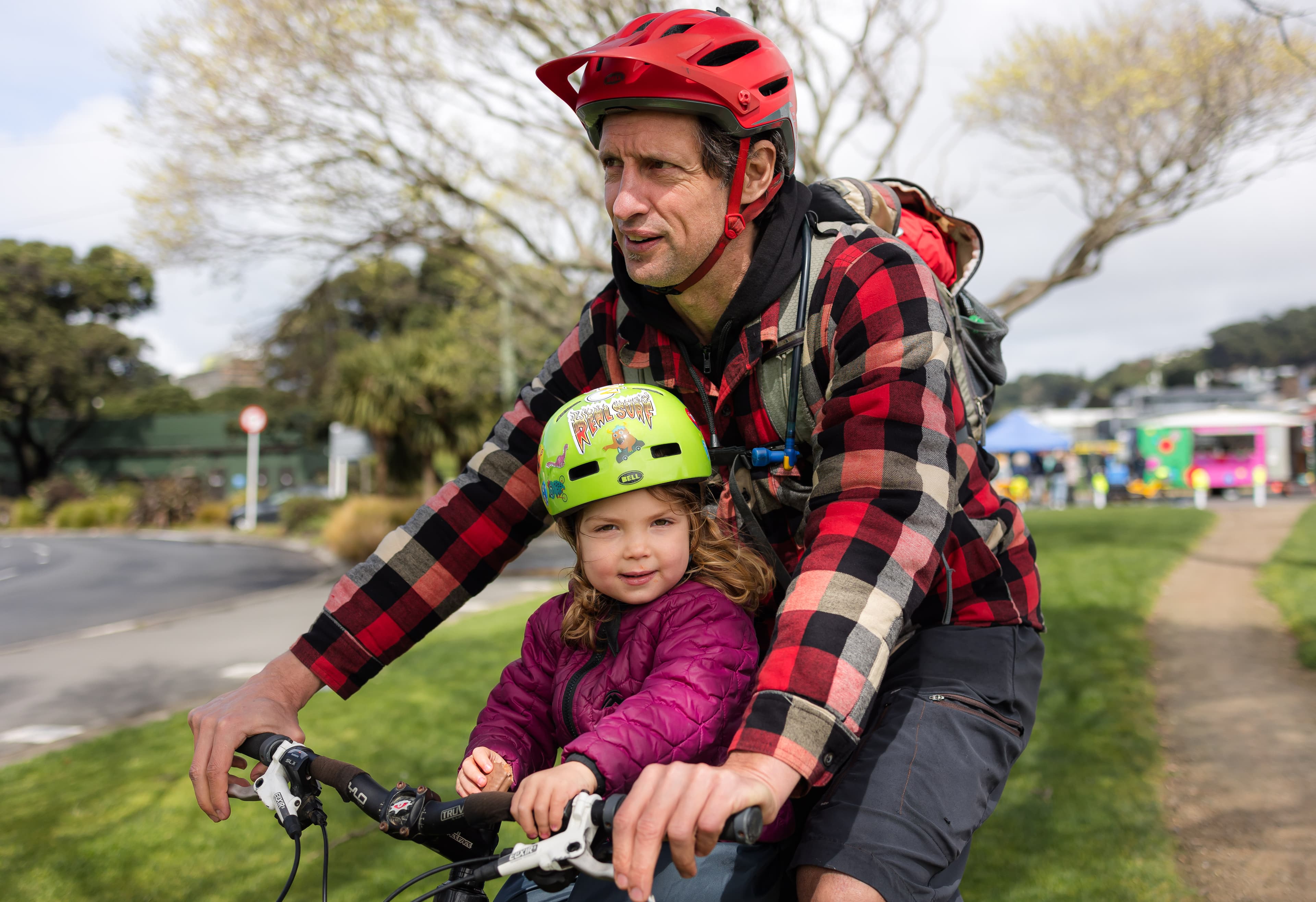 Dad and daughter on bike